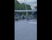 Girl backless top lean on glass railings