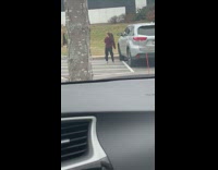 girl burgundy sweater parking lot car