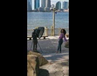 Woman violet top poses for photoshoot caught filmer