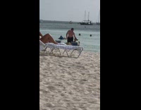 Man takes picture of woman and claps for him