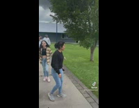 Ladies Scream as they Walk Away from Campus