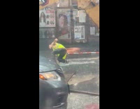Construction worker dives into sewer while raining
