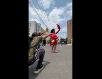 Woman wear red dress and crab claws