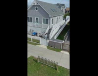 Girl sweater dance stairs  of grey house