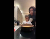 Collab ClipsIG - Mother and son cooks popcorn with pan