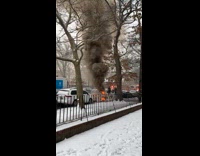 Submitter films huge fire from street manhole