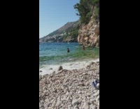 Woman bikini bow head hair flip beach waves