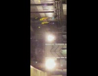 subway workers agains wall while subway passes by 