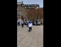 Teenagers Record and Takes Pictures with Man