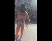 man on orange raft batman mask