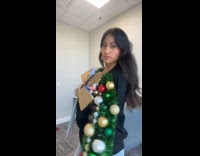 Woman wins ugly sweater contest at work