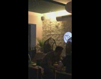 Hookah lounge two swing chairs three girls 