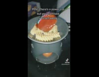 Woman cooks pasta on a wax burner