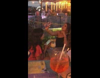 Black shirt girl selfie restaurant table cocktail 