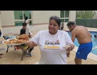Lady drops food while dancing with plate 