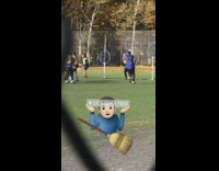 Quidditch game on soccer field with referee 