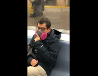 Asian man subway respiratory mask