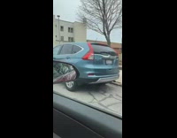 Orange shirt girl purple mural art