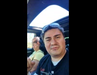 Huge moose chilling outside mans house