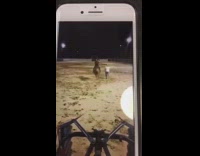 guy in gray shirt getting  tied with rope and falls