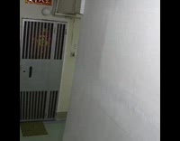 Girl runs away large black spider wall 