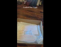 Woman gets a cut out Uggs for Christmas 