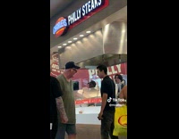 Older man yells at guy complaining cashier 