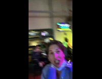 Collab Bitch MP - Guy singing karaoke in bar walking around with microphone 