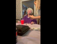 Elderly Lady Awes Over Colorized Photo of Sons