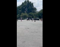 Group roller skating at parking lot