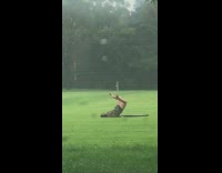 Girl uses boogie board in park