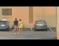 Girl lean brown wall supportive friends car