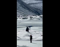 Collab IITW - Woman yoga pose on the frozen lake Part 1