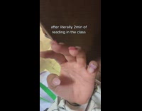 Girl hand shakes after reading in class