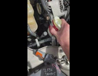 Guy puts deodarant on car belt