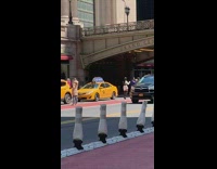 Woman fashionista photo shoot sidewalk nyc taxis