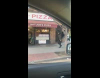 in car guy black wings with mask