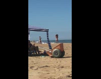 Guy gymnastic carry girl tent wheel barrow