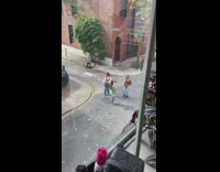 Three women in the middle of the street photoshoot
