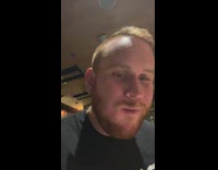 Guy takes out of top of corn on the cob