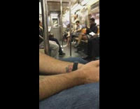 barefoot man with dirty feet on subway 