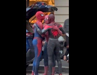3 spiderman hugging each other 