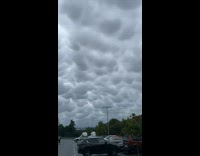Stratocumulus clouds formed in the sky at the parking lot