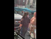 White diaper guy two cops blue umbrella 