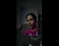 Cat reaching for womans hair