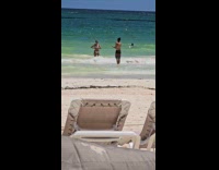 Collab IITW - Woman bikini poses gets pushed by wave