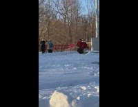 Guys in rodeo gear at park dance and follow each other