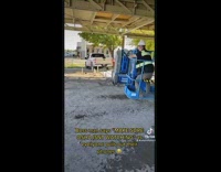 Worker in safety vest record friend on blue lift