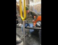 Guy brings entire basketball hoop onto subway train