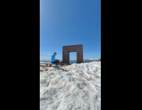 Guy Jumps in the Middle of Arc in Snow 